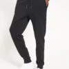 Everyday Essentials Regular Fit Joggers - Black 1 Everyday Essentials Regular Fit Joggers - Black -Barbou Clothing Shop TNEC3 SQ1 0000000004 BLACK MDf